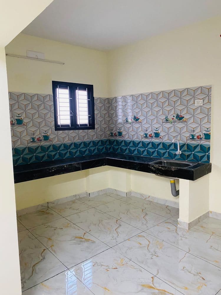 Attached kitchenette with counter and sink