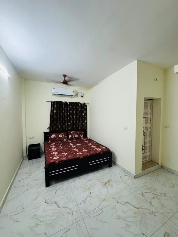 Comfortable bedroom with marble floor