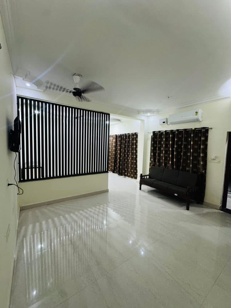 Comfortable lounge seating area at Hamza Residency Plaza