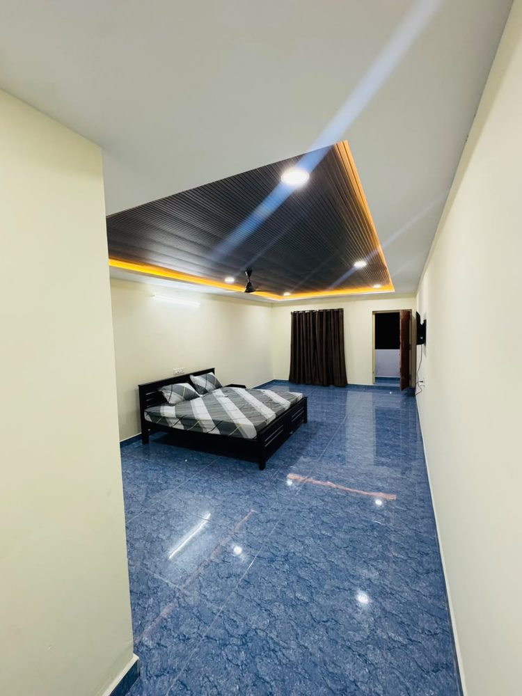Spacious deluxe room with marble flooring